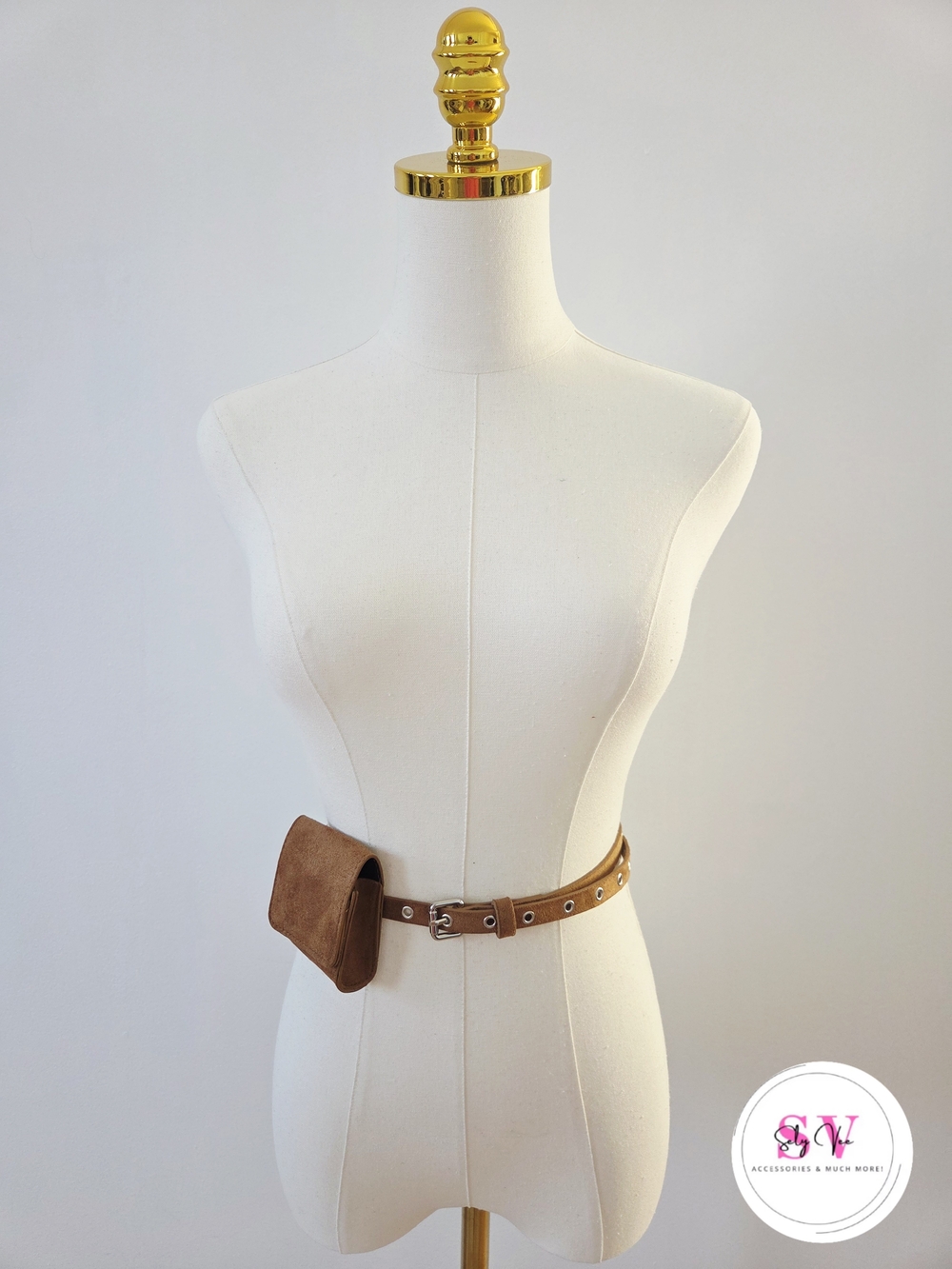 Brown suede belt with silver eyelets and small pouch